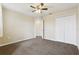 Bedroom with natural light, ceiling fan, and closet at 392 Summer Squall Rd, Davenport, FL 33837