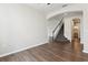 Open hallway with carpeted staircase and views of the living area and bathroom at 392 Summer Squall Rd, Davenport, FL 33837