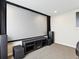 Home theater featuring a large screen, projector, and speakers at 392 Summer Squall Rd, Davenport, FL 33837