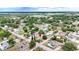 Aerial view of the home's location highlighting its neighborhood's charming tree lined streets at 1002 Ne 1St St, Mulberry, FL 33860