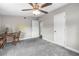 Bedroom featuring a ceiling fan, plush carpet, and ample closet space offering a customizable layout at 1002 Ne 1St St, Mulberry, FL 33860