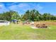 A community space with playground, covered picnic area and tables for relaxation and activities at 1002 Ne 1St St, Mulberry, FL 33860
