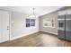 Cozy dining area with stylish lighting, wood-look floors, and room to entertain at 1002 Ne 1St St, Mulberry, FL 33860