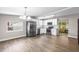 Bright, renovated kitchen featuring stainless steel appliances and ample counter space at 1002 Ne 1St St, Mulberry, FL 33860