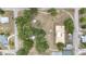Aerial view of the neighborhood park with playground, picnic tables, and sport court at 1002 Ne 1St St, Mulberry, FL 33860