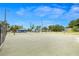 A well-maintained community tennis court offers residents a place to play and enjoy outdoor activity at 1002 Ne 1St St, Mulberry, FL 33860