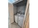Laundry area with washer and dryer inside of a closet with shelving at 13140 Summerton Dr, Orlando, FL 32824