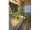 Bathroom featuring vintage green tile and a single vanity at 5532 Stull Ave, Orlando, FL 32810