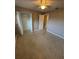 Neutral bedroom featuring a closet and a doorway at 5532 Stull Ave, Orlando, FL 32810
