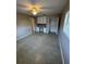Bedroom featuring a ceiling fan, closet, and built-in desk area for convenience and comfort at 5532 Stull Ave, Orlando, FL 32810