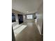 Bright living room with natural light, an open layout, and neutral tones throughout at 5532 Stull Ave, Orlando, FL 32810