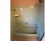 Shower featuring vintage green tile at 5532 Stull Ave, Orlando, FL 32810