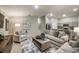 Open-concept living room that showcases modern decor and seamless flow to the kitchen at 1038 Foreshore Ln, Haines City, FL 33844