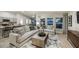 Spacious living room adjoining the kitchen with views of the backyard at 1038 Foreshore Ln, Haines City, FL 33844
