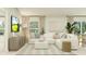 Comfortable living room with a large sofa, modern decor, and ample natural light at 2490 Mckinley Dr, Lake Wales, FL 33859