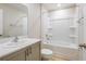 Pristine bathroom featuring a sleek vanity, modern fixtures, and a combined tub and shower at 3775 King Hill Dr, Haines City, FL 33844