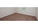 Carpeted bedroom with clean lines and white trim offers a comfortable and inviting space at 3775 King Hill Dr, Haines City, FL 33844