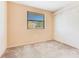 Cozy bedroom with neutral walls, carpet floors, window and closet space at 728 Waterbridge Dr, Winter Haven, FL 33880