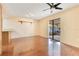 Open dining area featuring a ceiling fan, hardwood floors, and sliding glass doors leading to an outdoor patio at 728 Waterbridge Dr, Winter Haven, FL 33880
