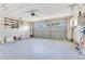Spacious garage with ample shelving and storage space at 728 Waterbridge Dr, Winter Haven, FL 33880