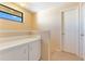 Upstairs landing with storage cabinets and natural light at 728 Waterbridge Dr, Winter Haven, FL 33880