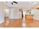 Spacious living room boasting beautiful wood floors and an open floor plan at 728 Waterbridge Dr, Winter Haven, FL 33880