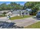 Charming one-story home featuring a well-maintained lawn, driveway, and a two-car garage at 748 Sagewood Dr, Lakeland, FL 33813