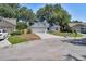 Charming one-story home featuring a well-maintained lawn, driveway, and a two-car garage at 748 Sagewood Dr, Lakeland, FL 33813