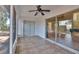 Screened-in porch with sliding glass door leading to a sunlit interior at 748 Sagewood Dr, Lakeland, FL 33813