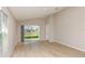 Spacious living room features vaulted ceilings, natural light, and easy access to the outdoor space at 4015 Gardenia Ave, Lake Hamilton, FL 33851