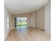 An airy living room with sliding glass doors that provide great backyard views and natural light at 4015 Gardenia Ave, Lake Hamilton, FL 33851
