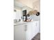 Modern bathroom with double vanity, large mirror, and decorative wall accents at 4027 Gardenia Ave, Lake Hamilton, FL 33851
