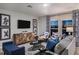 Comfortable living area with a contemporary design, modern furniture, and natural light from the window at 4039 Gardenia Ave, Lake Hamilton, FL 33851