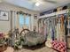 Unique bedroom design featuring a cozy corner with custom furnishings at 4730 Se 141St Pl, Summerfield, FL 34491