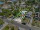 Aerial view of the property highlighting the pool, yard, and surrounding neighborhood at 536 Ave G Se, Winter Haven, FL 33880