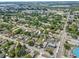An aerial view of the neighborhood with many trees at 536 Ave G Se, Winter Haven, FL 33880