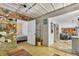 The hallway has a decorative stone wall and tile flooring at 536 Ave G Se, Winter Haven, FL 33880