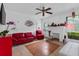 Inviting living room featuring bright accents, ceiling fan, and ample natural light at 536 Ave G Se, Winter Haven, FL 33880