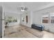 Living room features tile flooring, neutral walls, and lots of natural light from the windows at 536 Ave G Se, Winter Haven, FL 33880