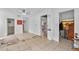 Bright living room boasts tile floors, neutral walls, and lots of natural light at 536 Ave G Se, Winter Haven, FL 33880