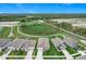Wide aerial view of single-Gathering homes near green space and trails at 800 Reggie Rd, Winter Haven, FL 33884