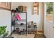 Inviting foyer with a shoe rack and storage, creating an organized and welcoming entrance at 1852 E Fern Rd, Lakeland, FL 33801