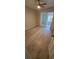 Spacious bedroom offering modern flooring and natural light from a sliding glass door at 312 Dorothy Ave, Daytona Beach, FL 32117
