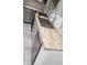 Modern kitchen featuring butcher block countertops, stainless steel appliances, and marble backsplash at 312 Dorothy Ave, Daytona Beach, FL 32117