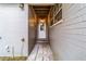 Back entrance featuring steps to door, painted brick and lighting at 208 Se 32Nd Ave, Ocala, FL 34471
