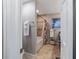 Bathroom featuring a shower with neutral tile and granite counters at 208 Se 32Nd Ave, Ocala, FL 34471
