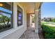 Exterior facade featuring stone accents and a brick paver walkway leading to the front of the home at 1839 Via Lago Dr, Lakeland, FL 33810