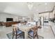 Open floor plan showcasing the kitchen and dining area with a view of the living room at 1839 Via Lago Dr, Lakeland, FL 33810