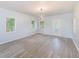 Spacious living room with wood floors and ample natural light, creating a welcoming atmosphere at 211 W Crescent Dr, Lakeland, FL 33805