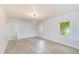 Bright and airy living room with wood floors, offering a stylish and comfortable living space at 211 W Crescent Dr, Lakeland, FL 33805